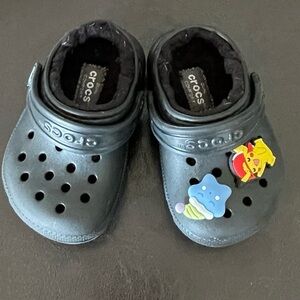 Crocs black fleece lined slip on mules clogs  with charms size child 4